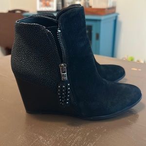 Black velvet and sequined boots.